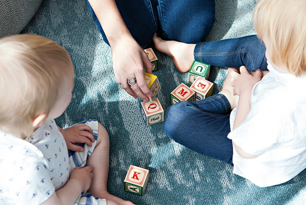 Children playing with blocks, illustrating CBD precautions for neurodevelopment